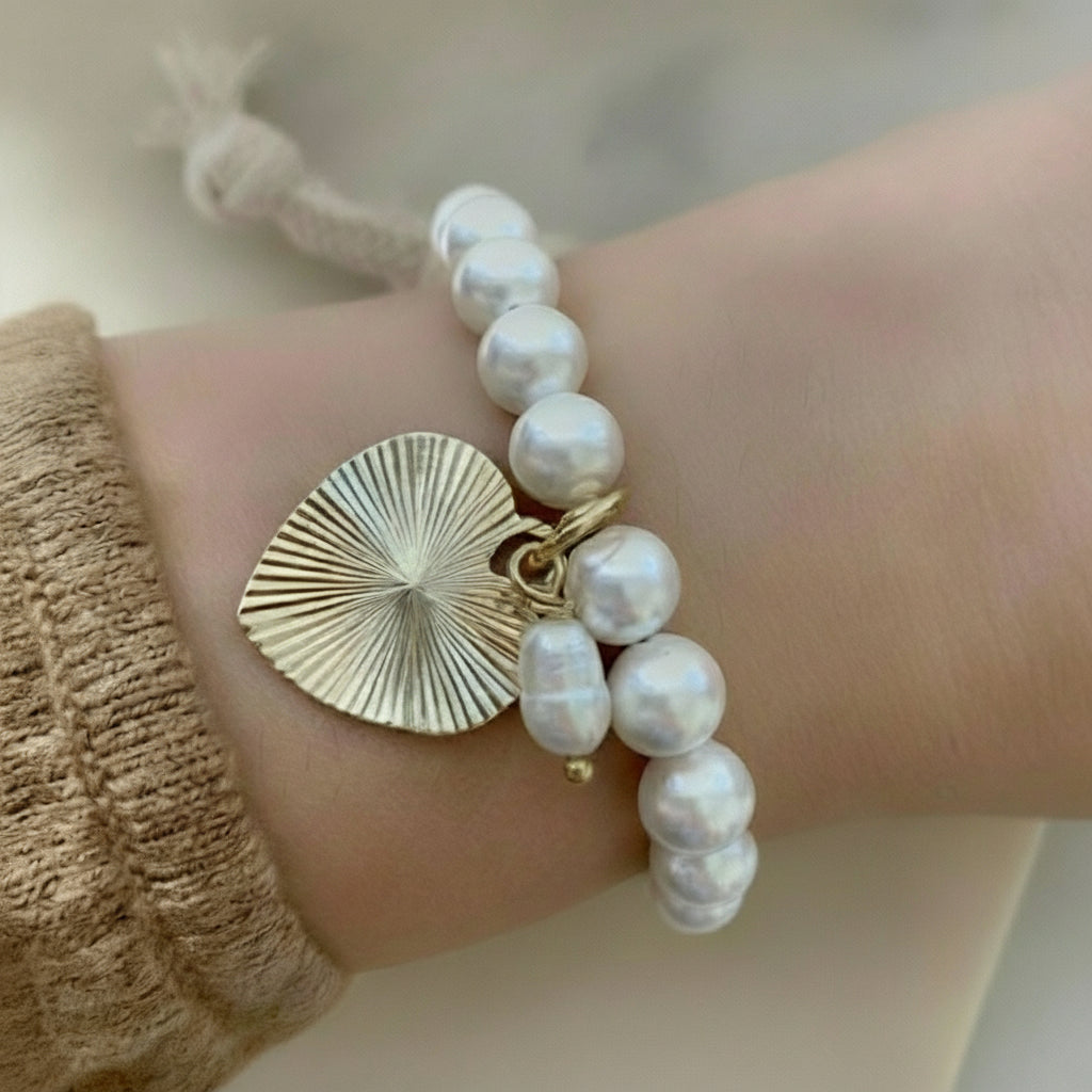 Freshwater pearl gold heart charmed bracelet